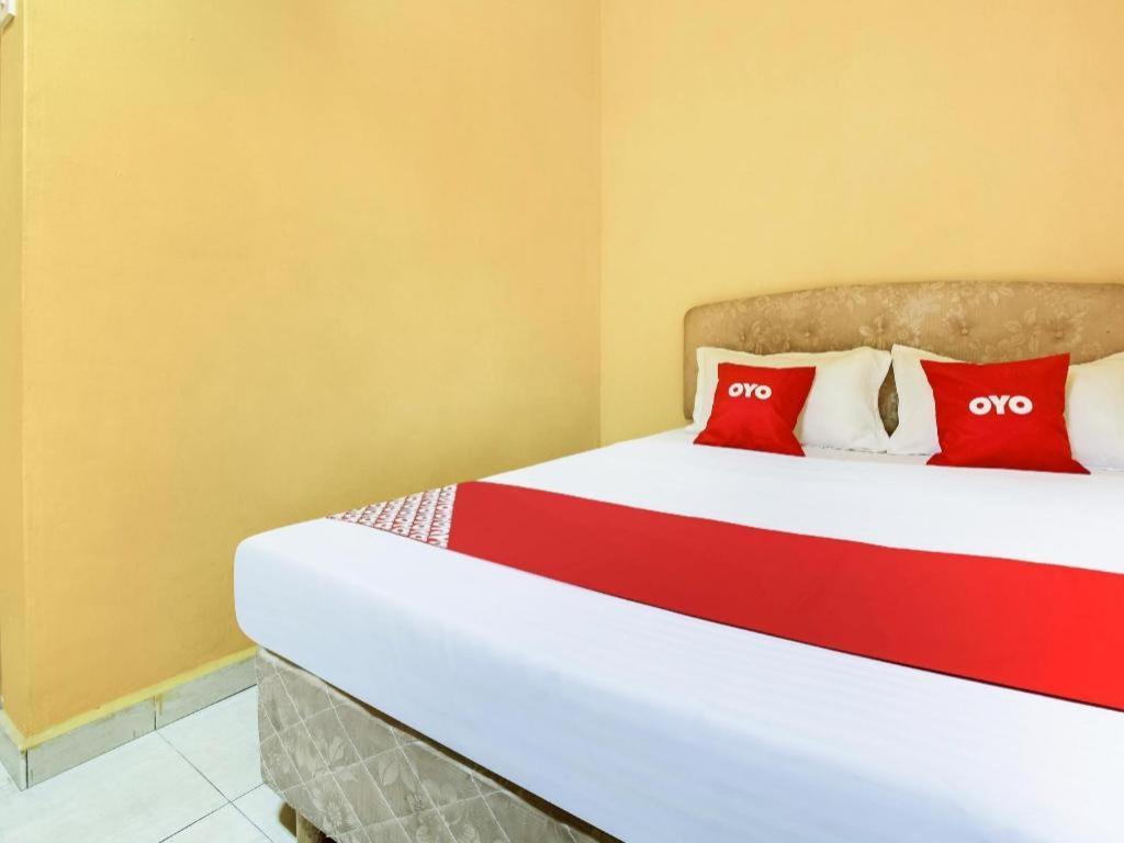 Oyo 89406 Lucky Budget Hotel Nilai Dış mekan fotoğraf