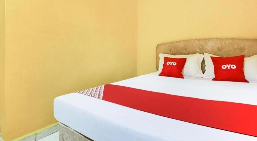 Oyo 89406 Lucky Budget Hotel Nilai Dış mekan fotoğraf